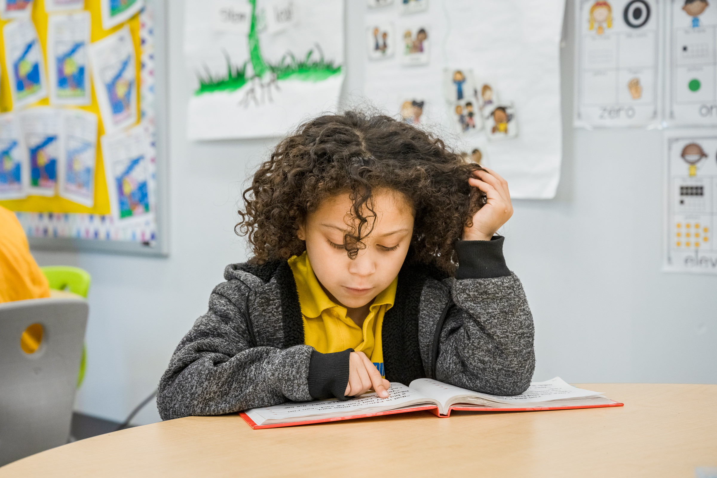 student reading in class